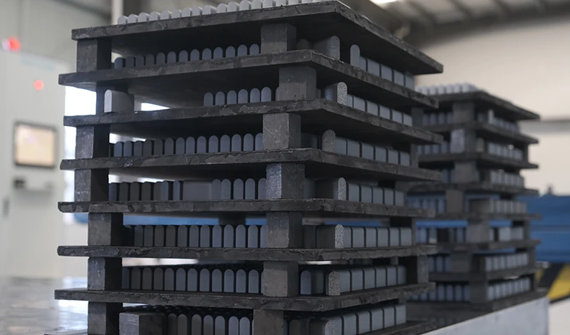 Samples of different tungsten carbide grades for snow plow applications